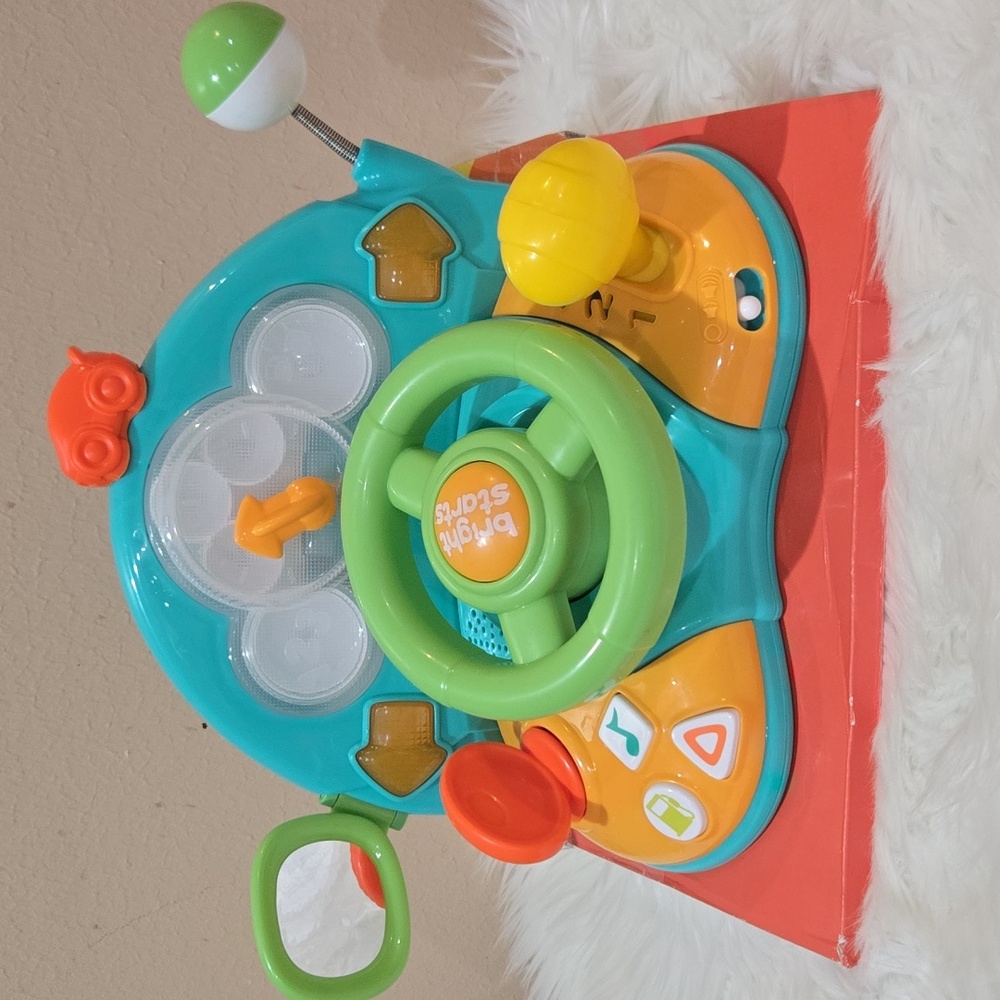 Bright Starts Lights and Color Driver toy With melodies